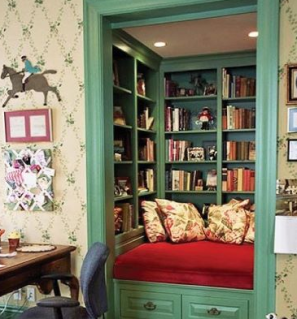 green trim closet with no door and bookshelves